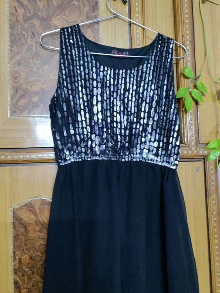 Black slip dress, ankle length. Regular fit party wear dress