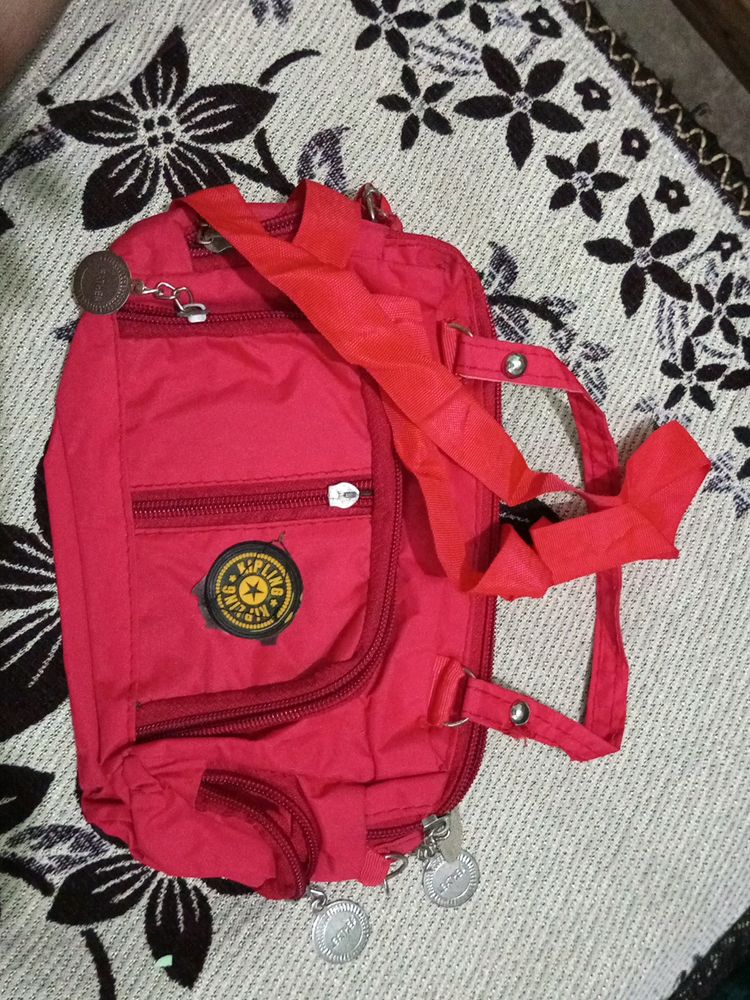 Red Colour Sling Bag With Many Compartment