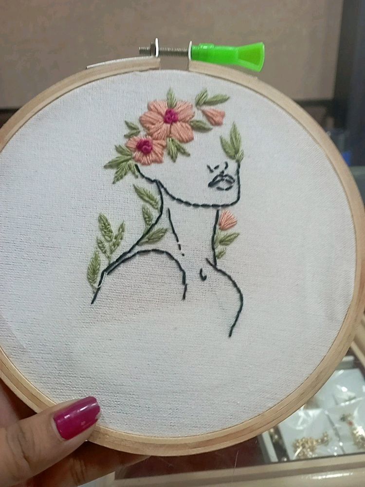 Handmade Embroidery Of Women And Flowers