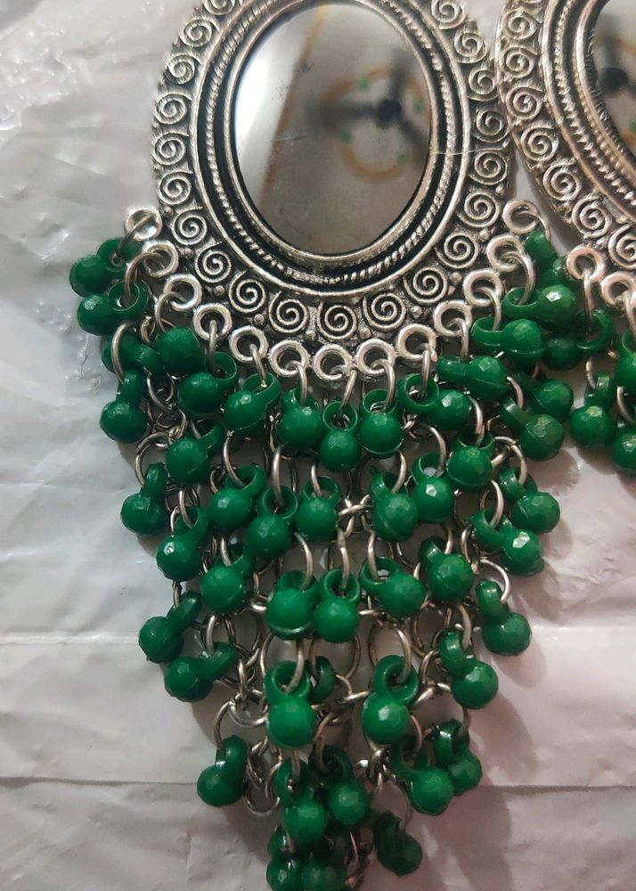 Earrings Green In Color