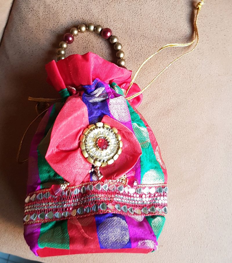 Small Bag To Carry With Saree.