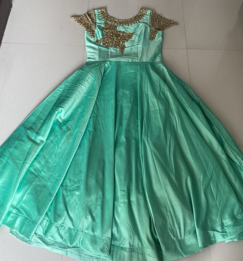 Beautiful Pista Colour Gown With Sleeves Pattern