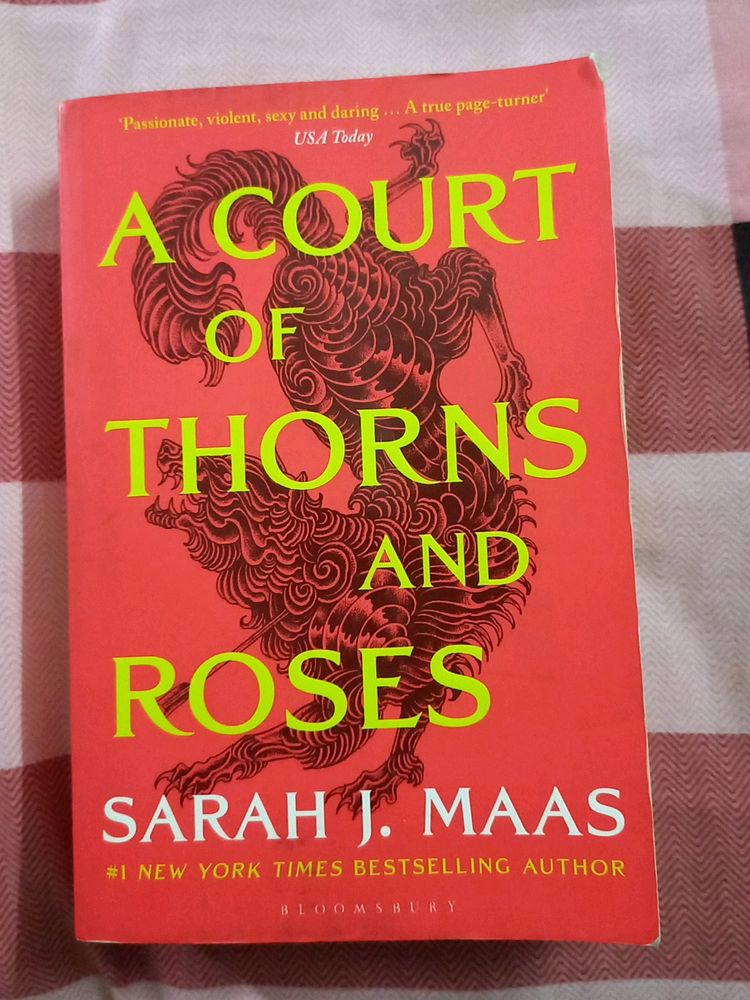 A COURT OF THORNS ND ROSES