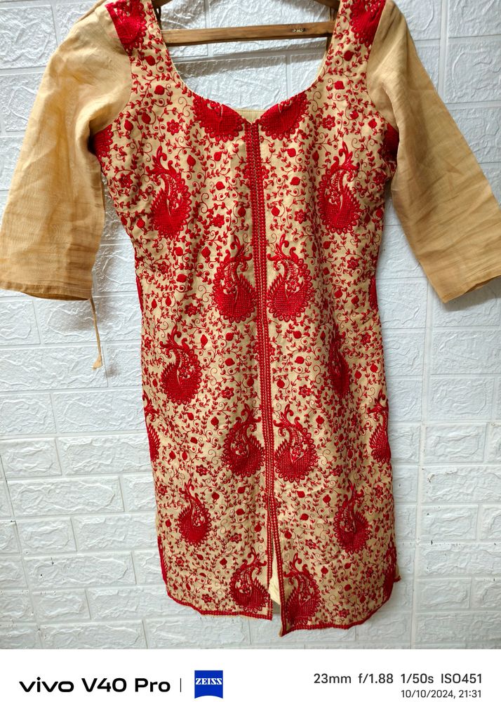 Golden Kurti With Red Embroidery