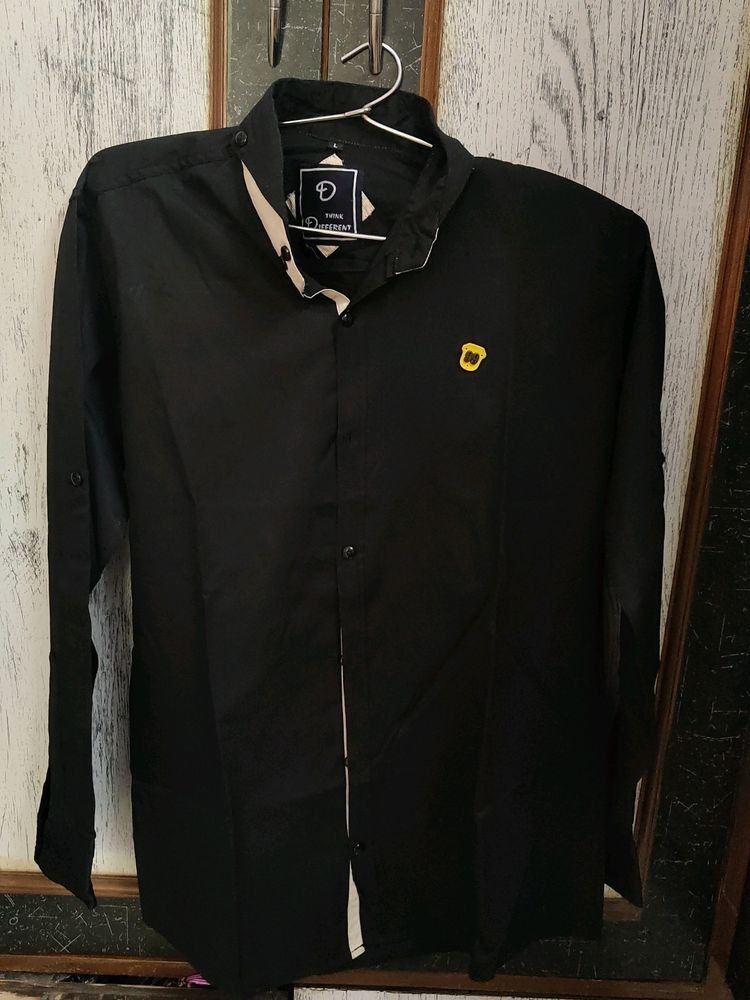 Black Shirt In Wearable Condition