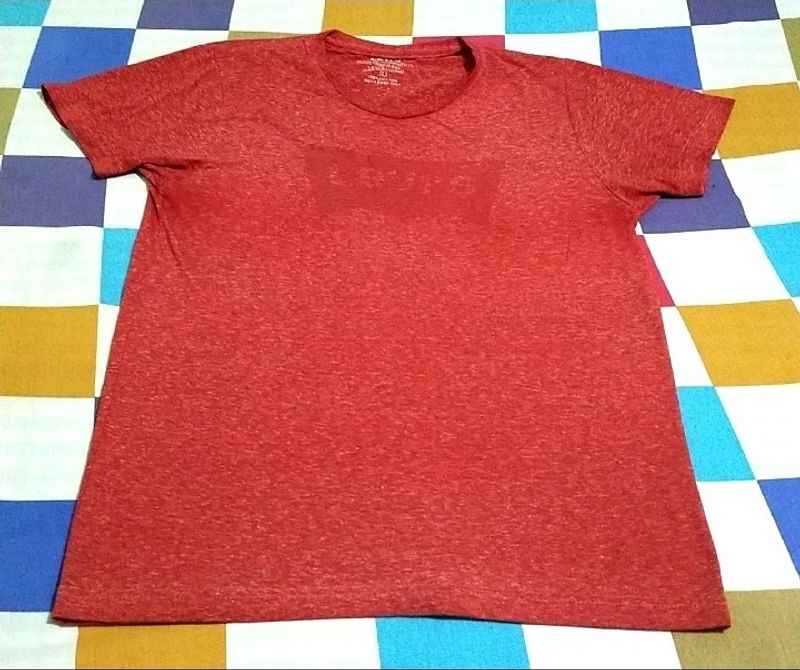 IT IS WOMEN'S LEVIS RED TOP.....