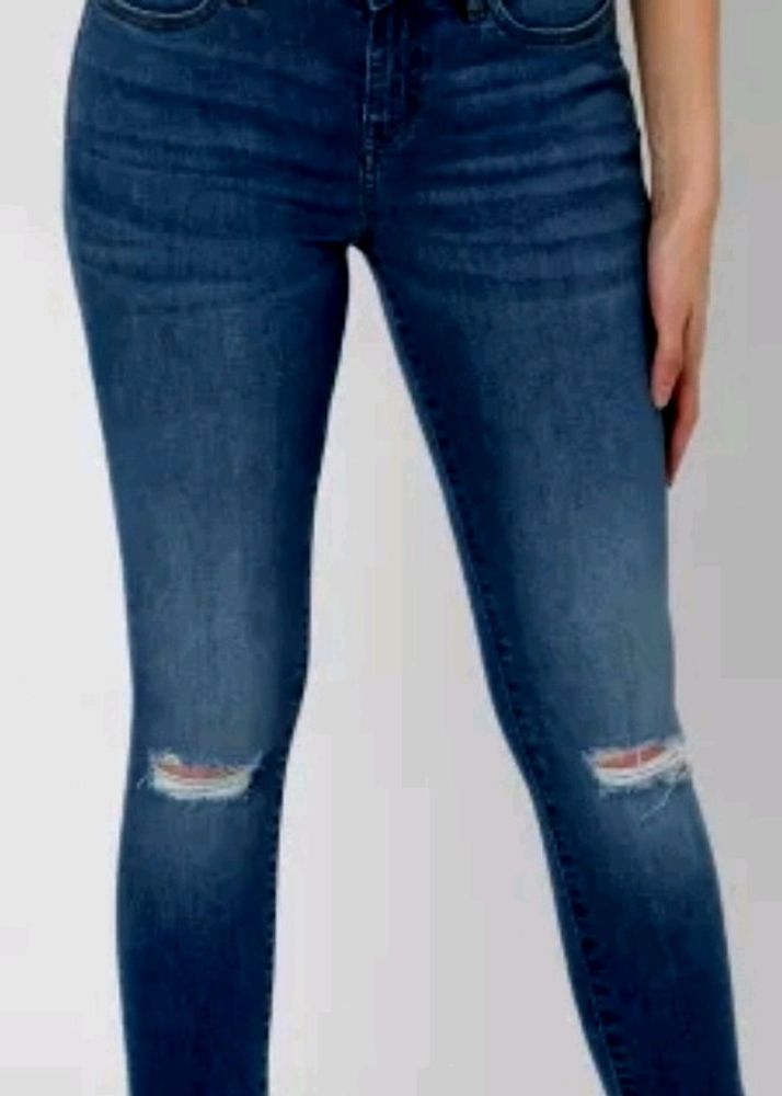 Blue Torn Stretchable Jeans For Women