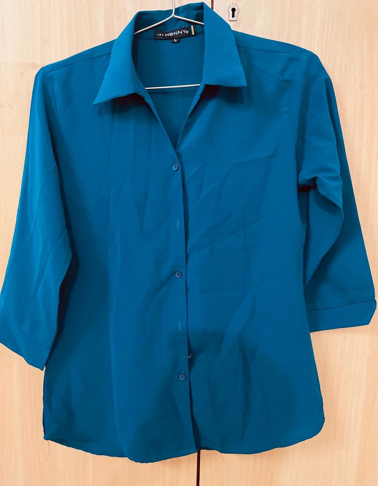 A Dark Peacock Green Colour Shirt.