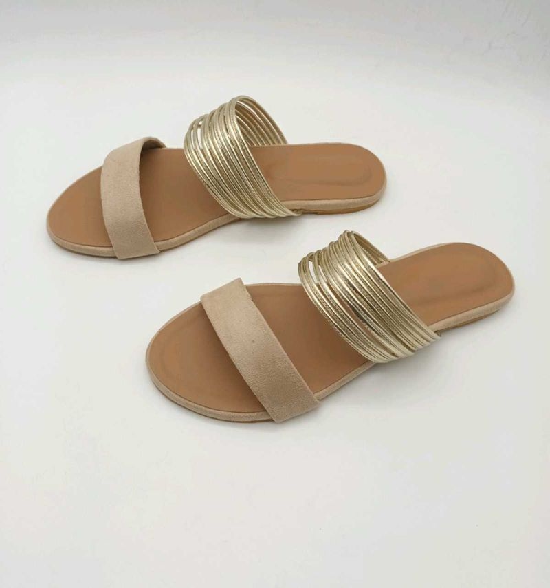 Tan And Gold Flat Sandals.