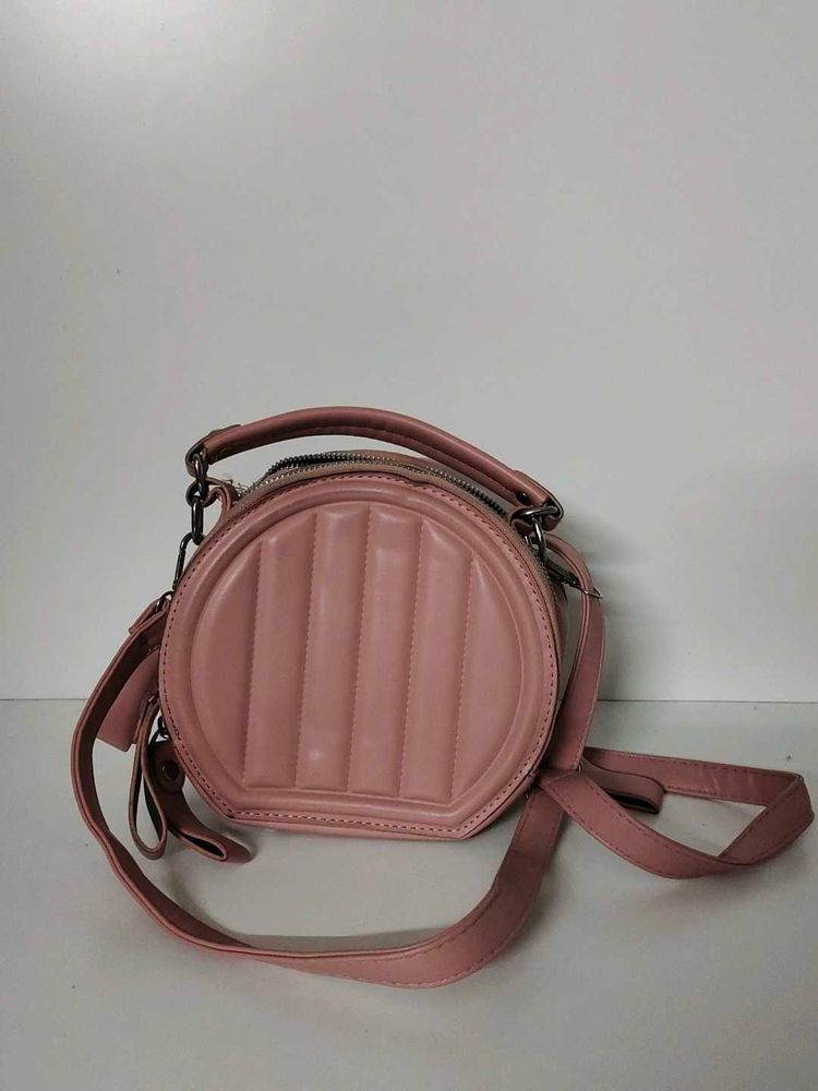 cute and pinteresty peach colour sling bag