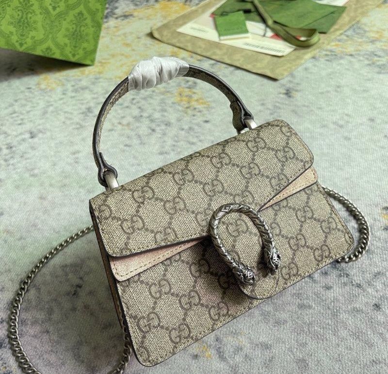 GUCCI- DAONUSUS TOP HANDLE BAG