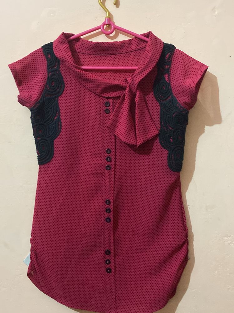 A Very Beautiful Dark Rani Colour Top.