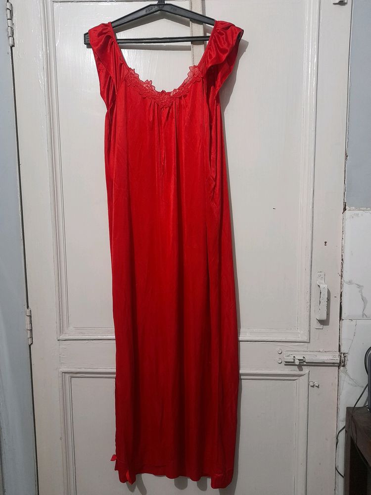 red color satin nighty and golden clutch