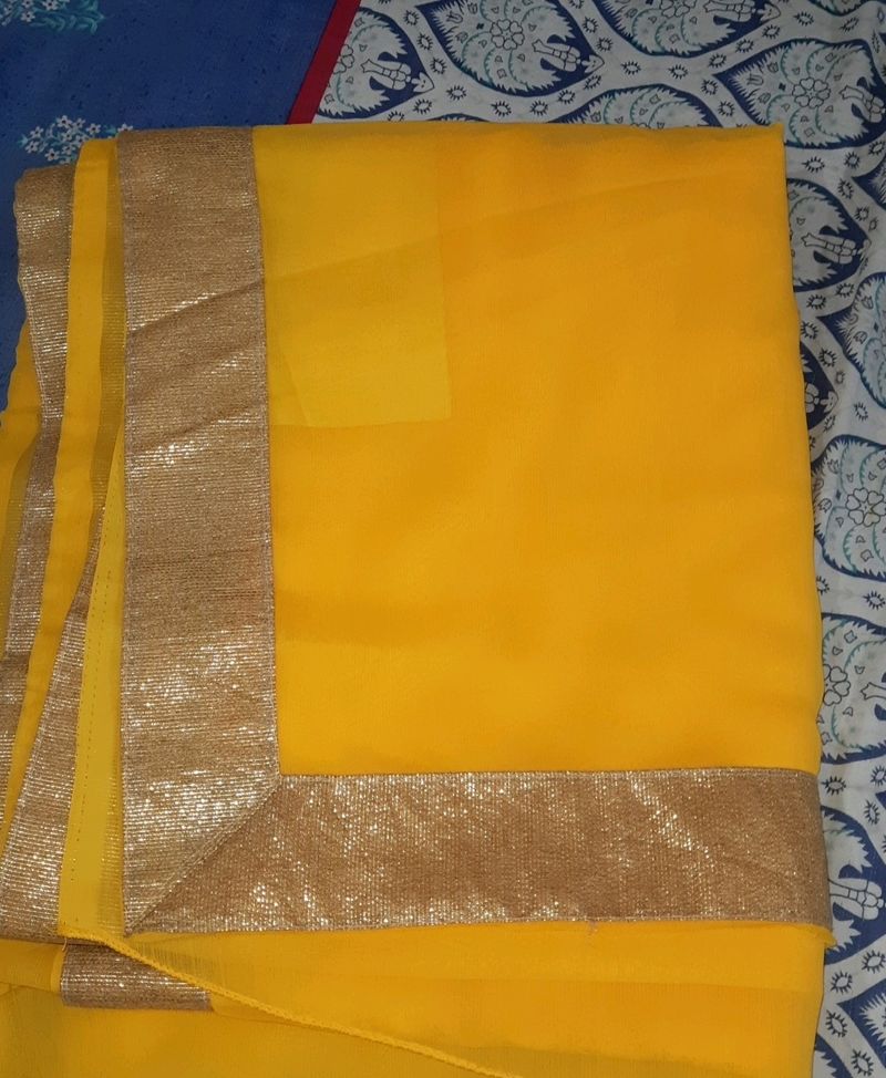 Plain yellow sari