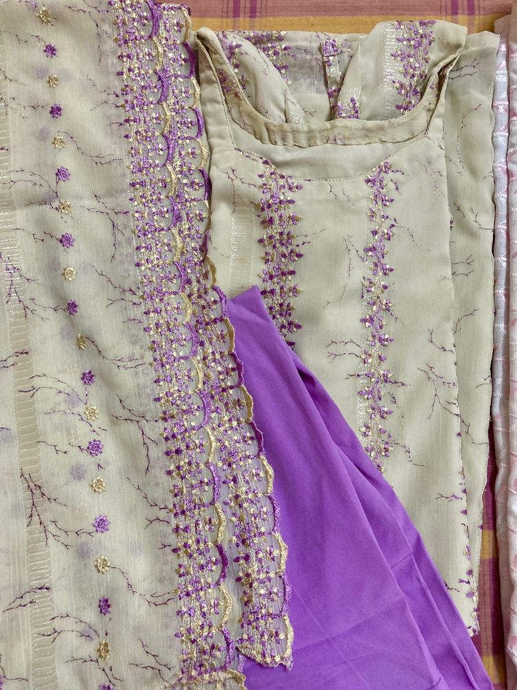 cream n lavender heavily embroidered suit set