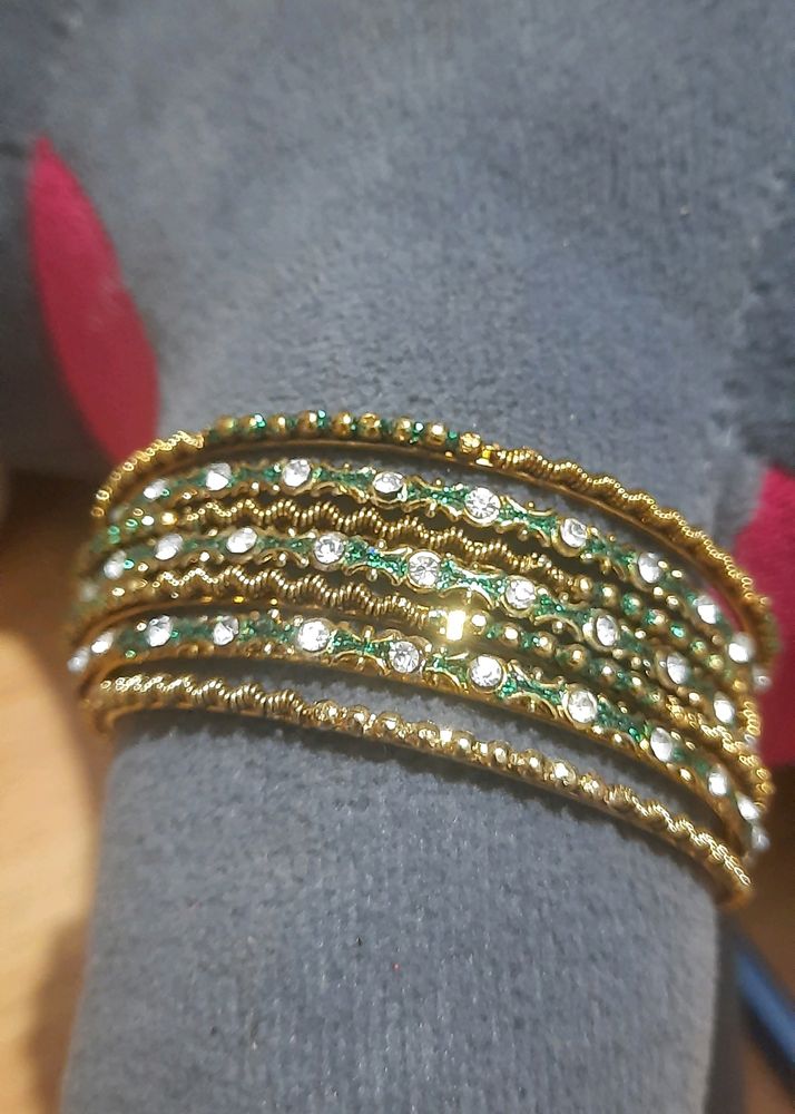 Green and gold bangle set