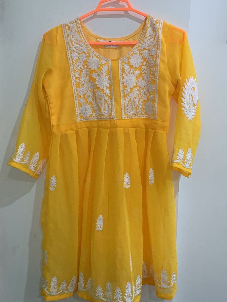 Yellow Kurti with half net and chikankari work