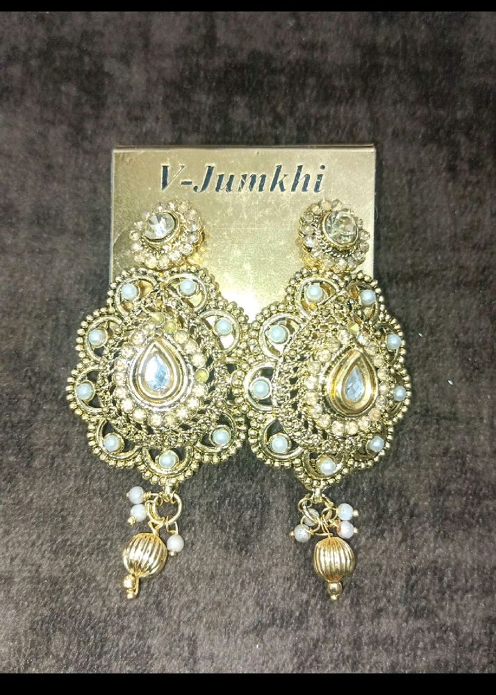 Golden heavy earrings