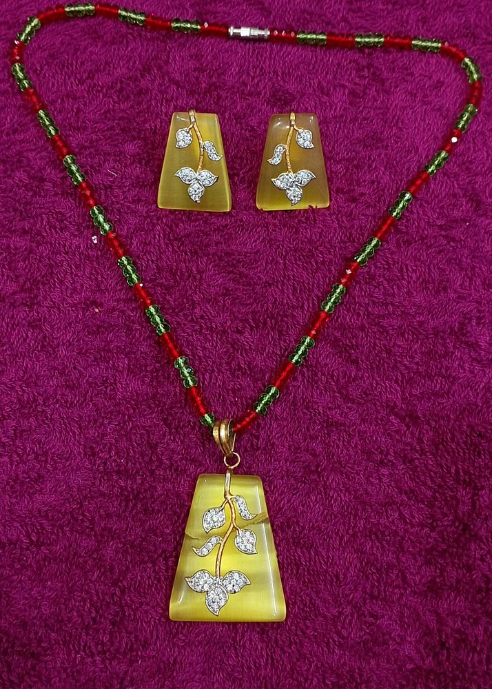 Yellow Pendant With Earrings