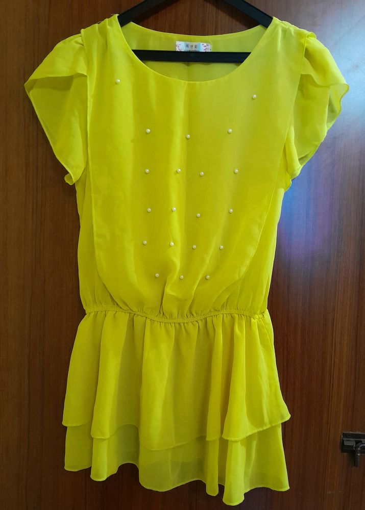 yellow cinched waist top