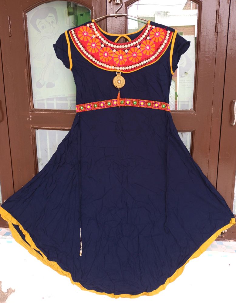 Flared Women Kurti With Rajasthani Work .