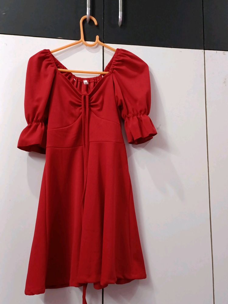 Red dress with frilly sleeves