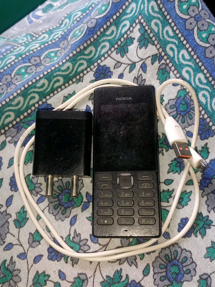 A  Nokia Phone With Charging Cable Type B