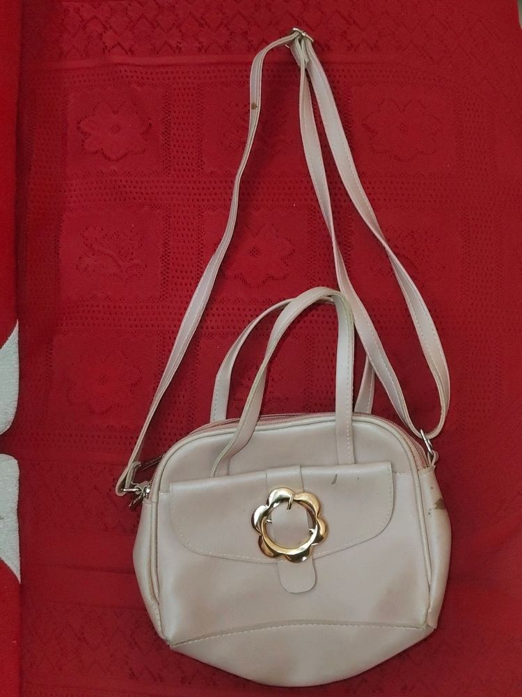 Peach Colour Hand Bag And Sling Also