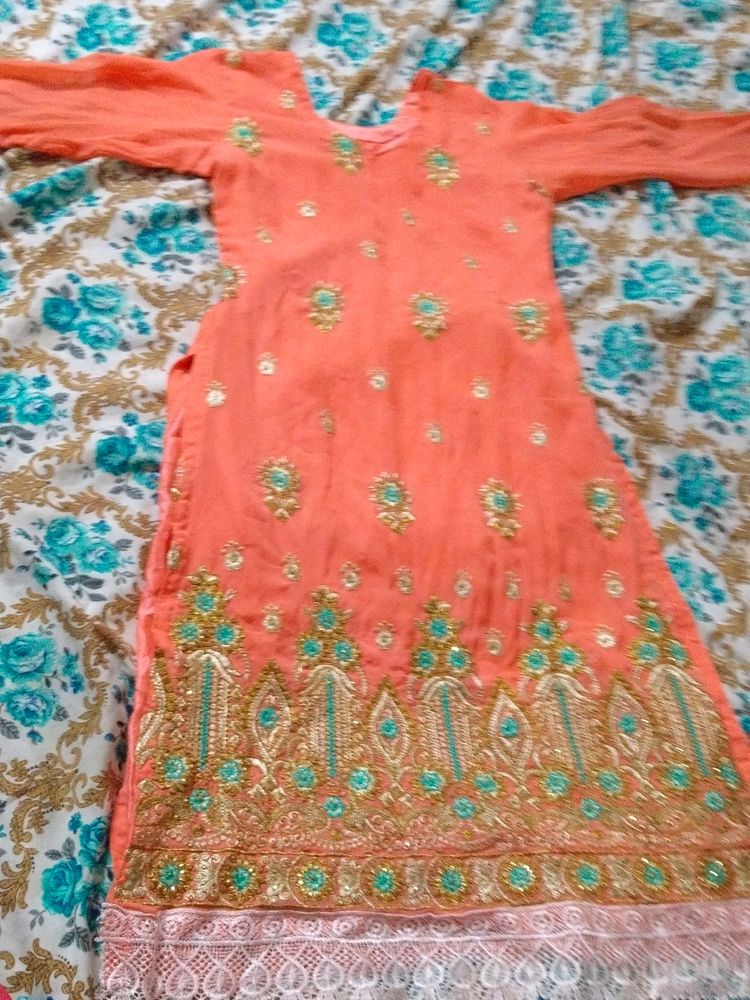 Embroidery With Some Stone Work Kurti.