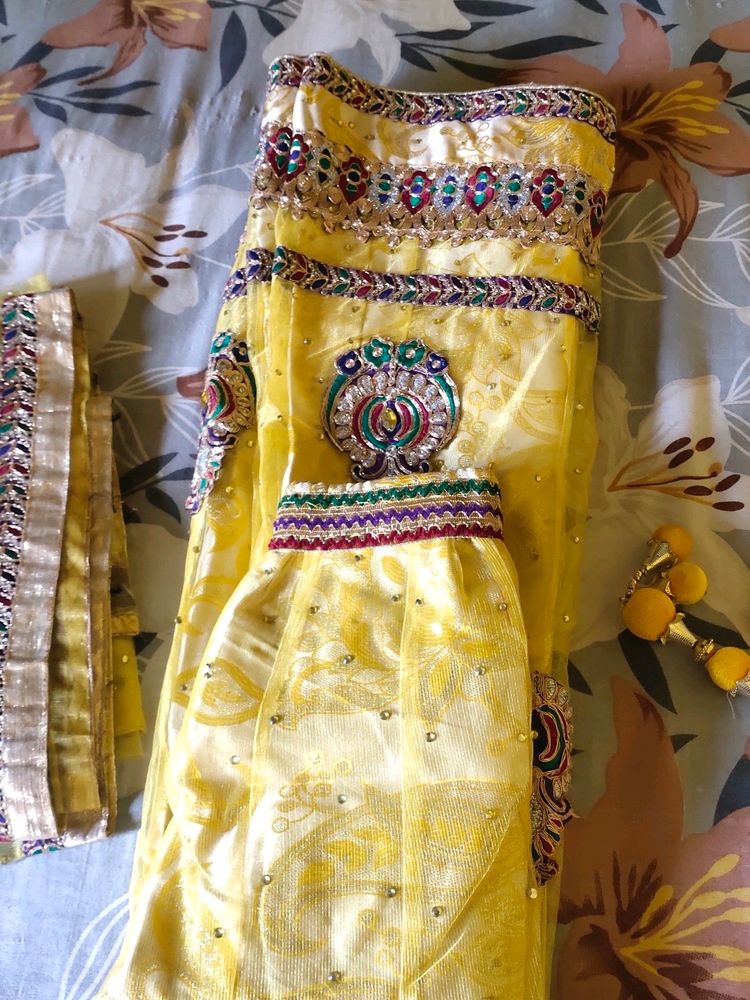 Heavy Yellow Color Net Lehnga Choli