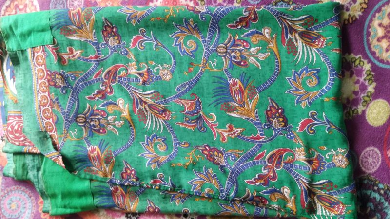 Green Saree With Multiple Color Designs