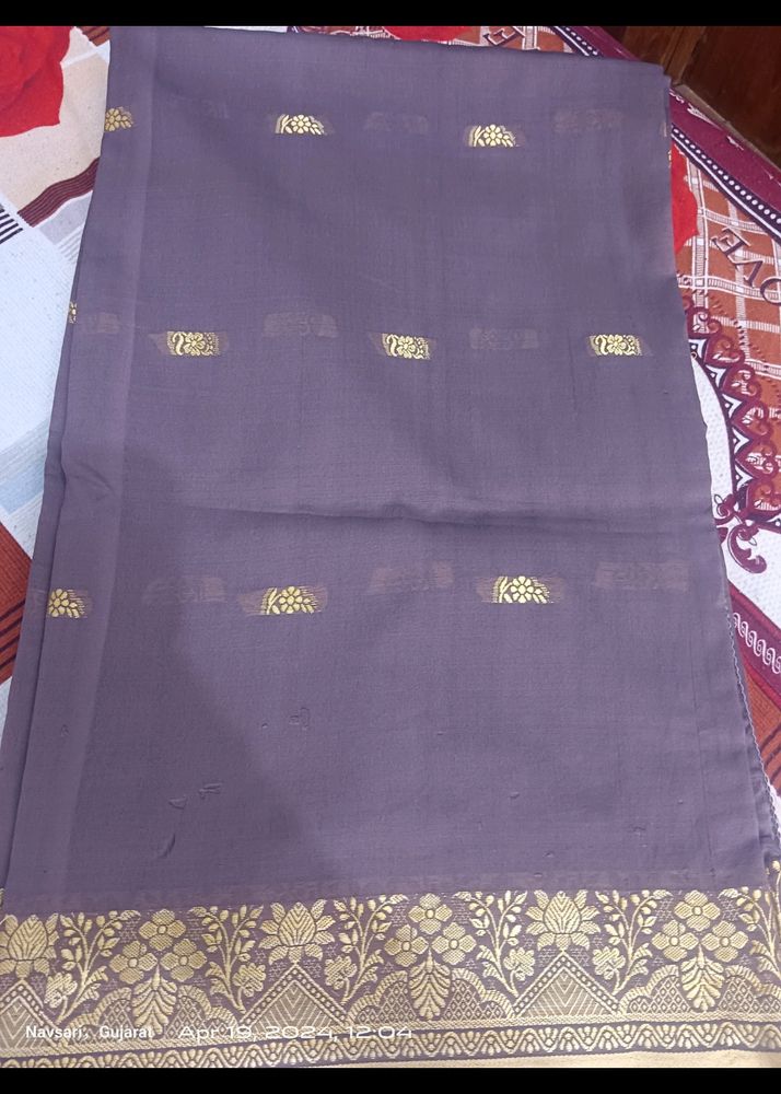 A Dark Lavender Saree With Border ....