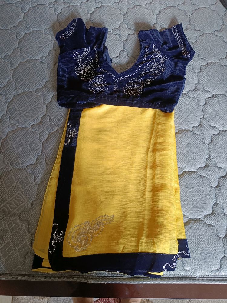 Shining Yellow Saree With Navy Blue Blouse