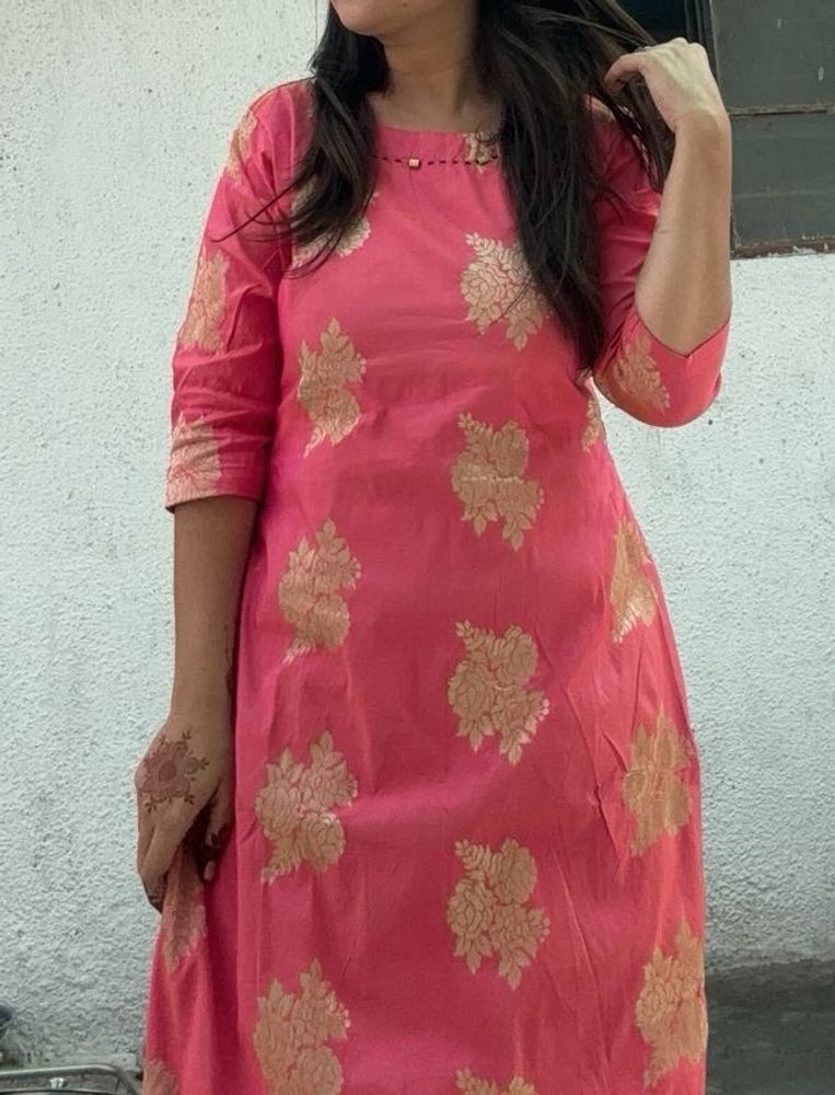 A Bright Pink Kurta With Neck Design