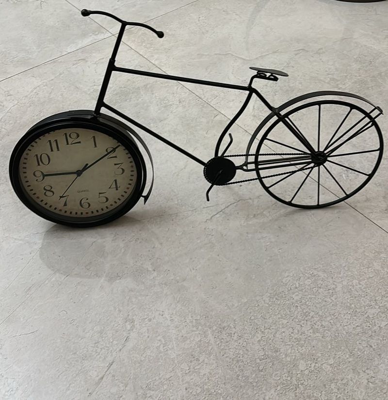 Cycle Shaped Clock