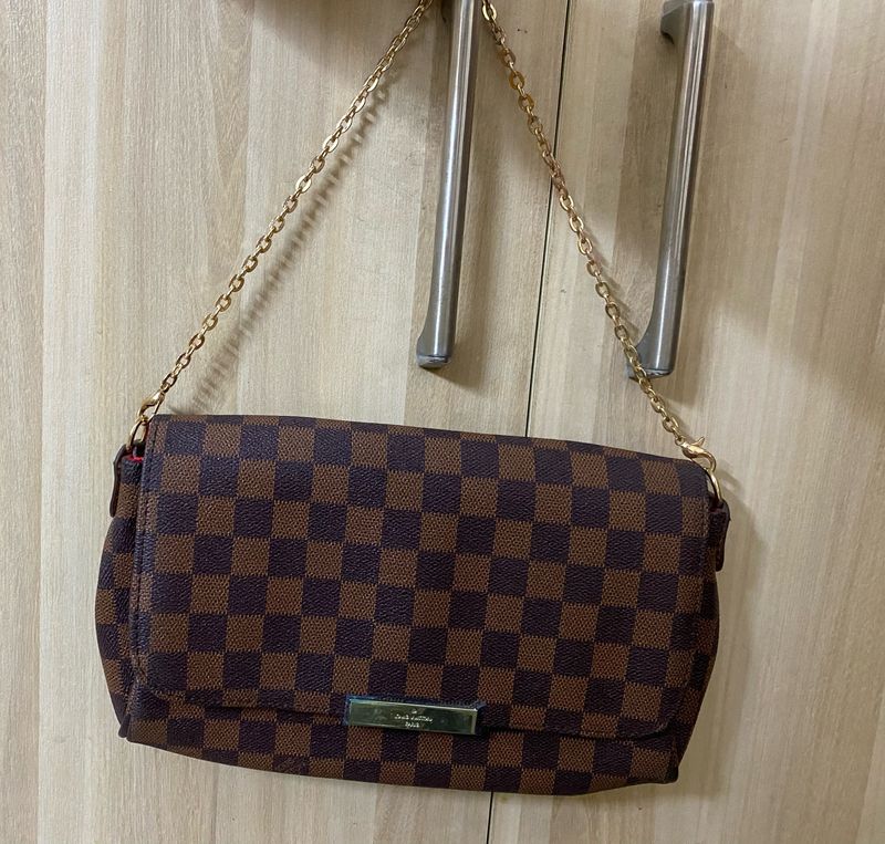 Louis Vuitton Sling Bag (It's A Copy)