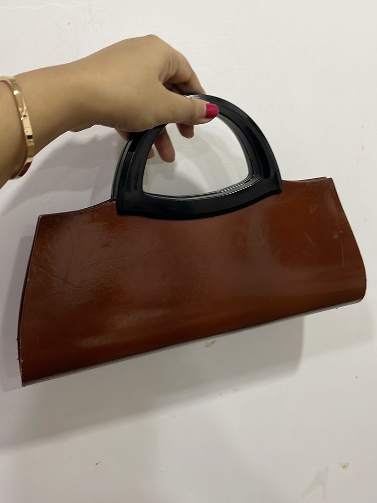 Brown Handheld Clutch