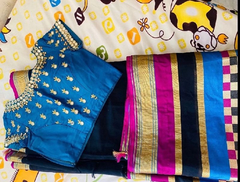 Blue Work Blouse And Black Saree