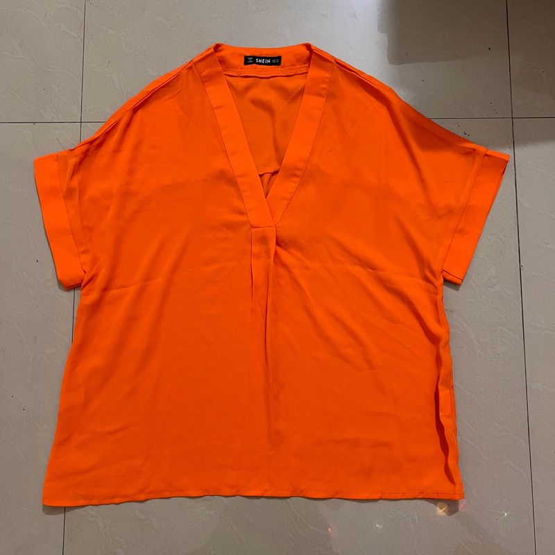 Orange boxy top