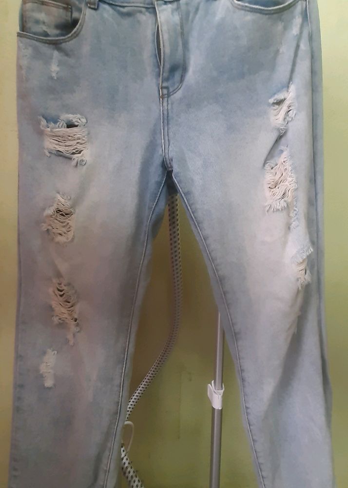 Distressed Light Blue Ripped Jeans