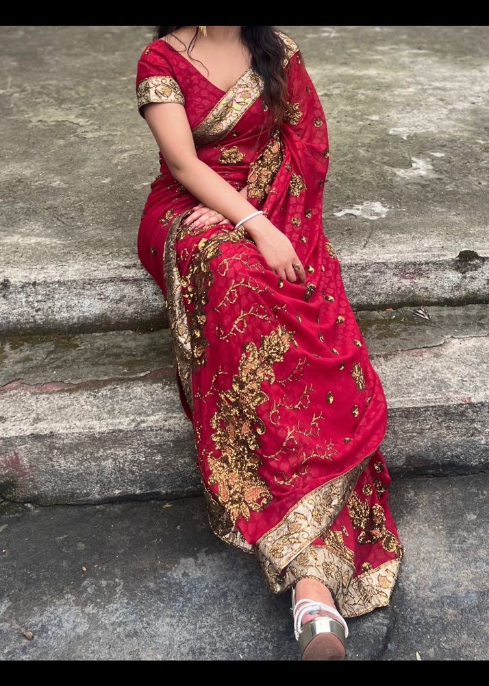 Red saree with golden zari work