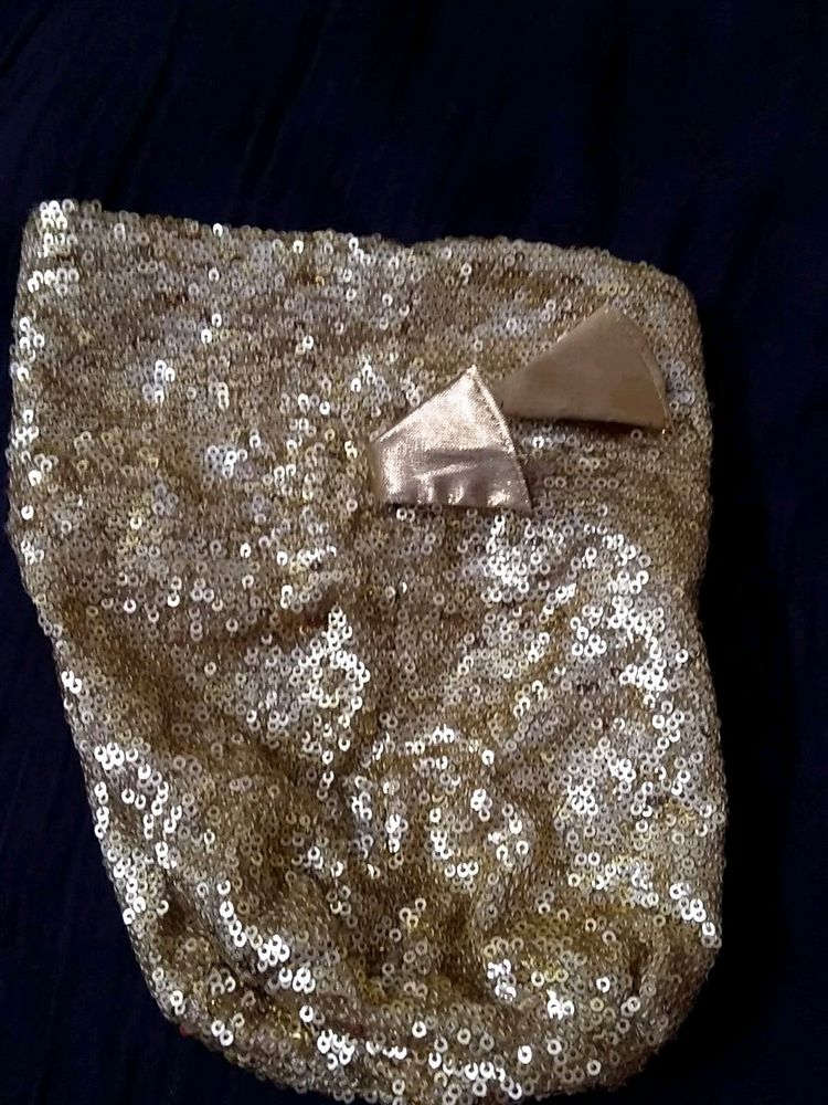 Golden sequined potli