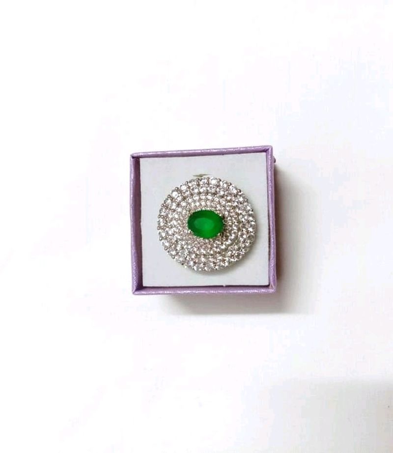 Emerald green stone women's ring.