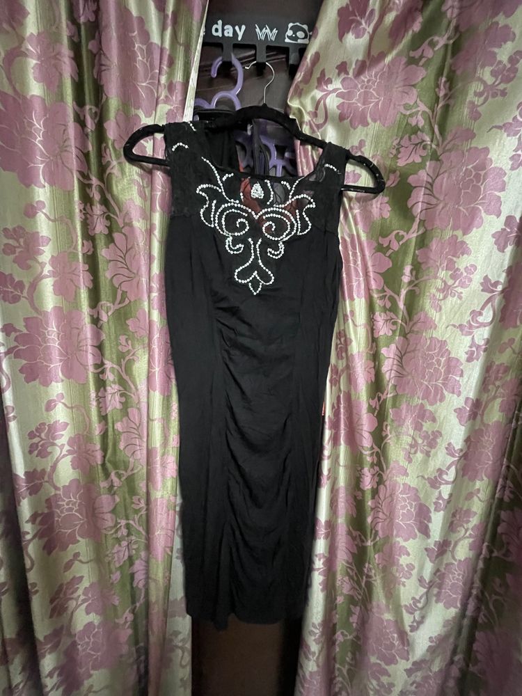 A Sexy Cheesy Mini Black Body Hugging Dress For Ho