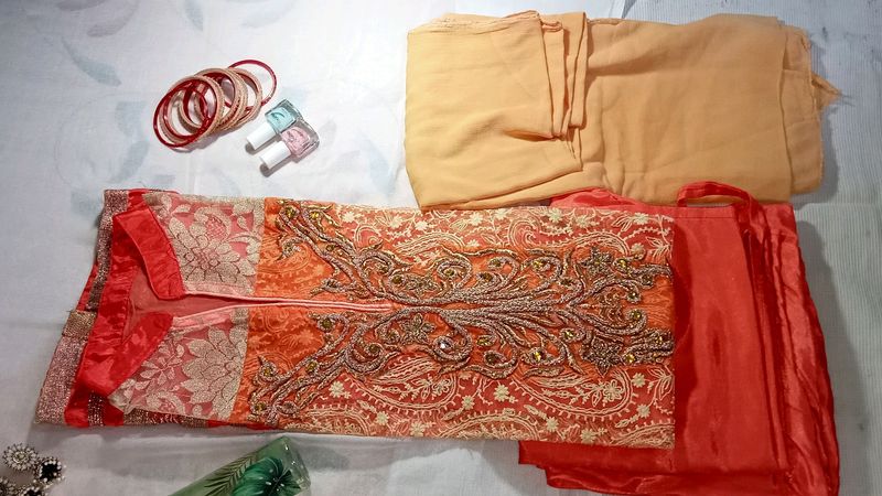 Coral Net And Satin Kurta Pyjama Set With Dupatta