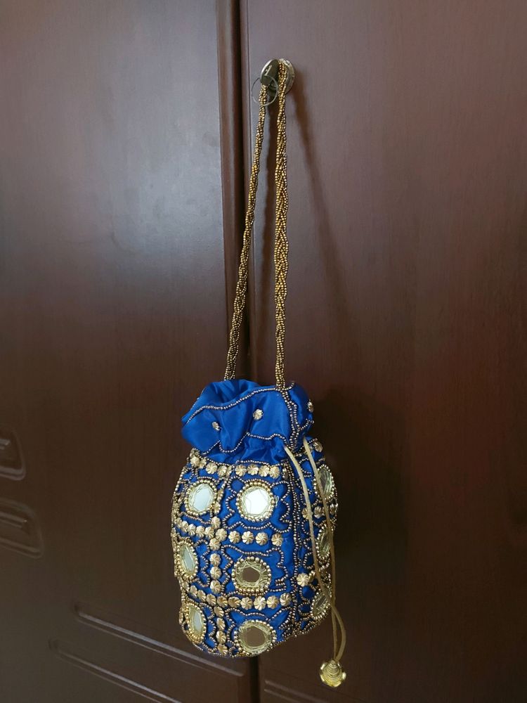 Royal blue colour potli bag..