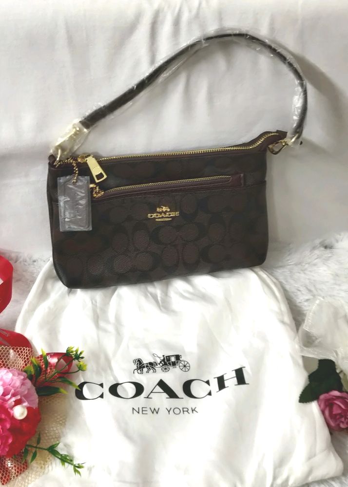 🎀👛A COACH INSPIRED SLING BAG WITH 2BELTS,1 POUCH