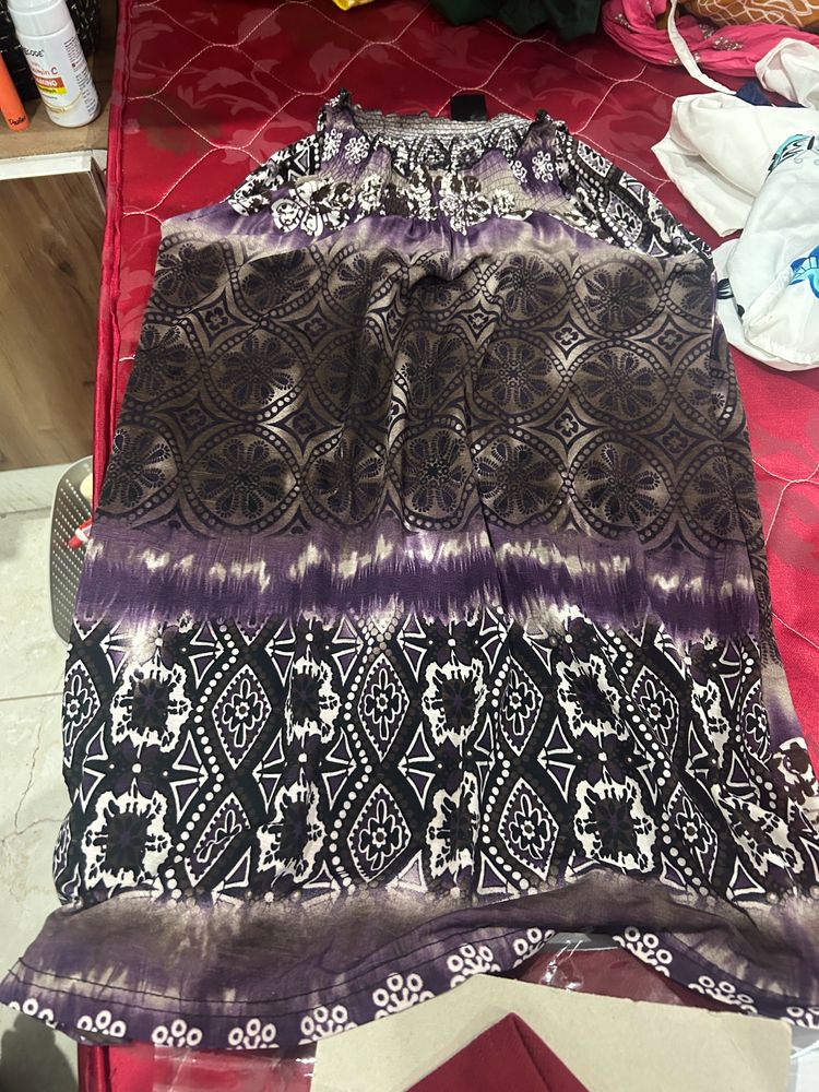 Selling A Purple & Black Dress.