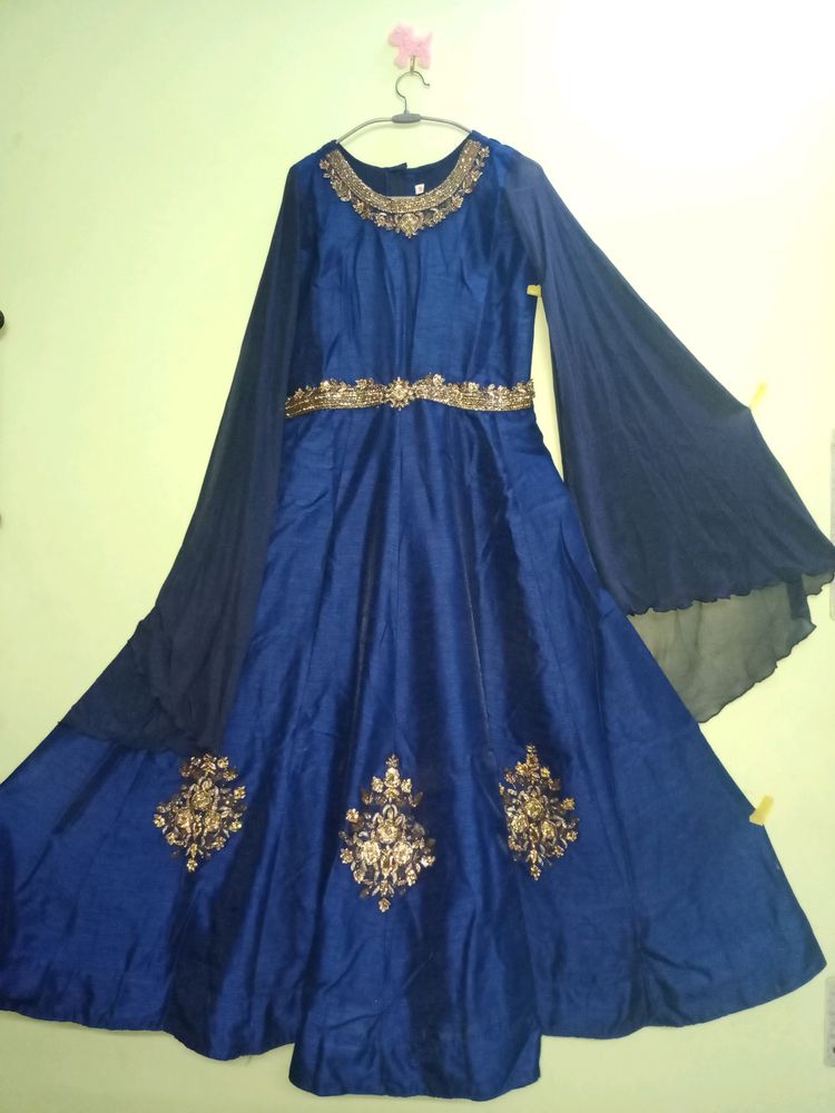 Festive Gown With Extended Cape Sleeves