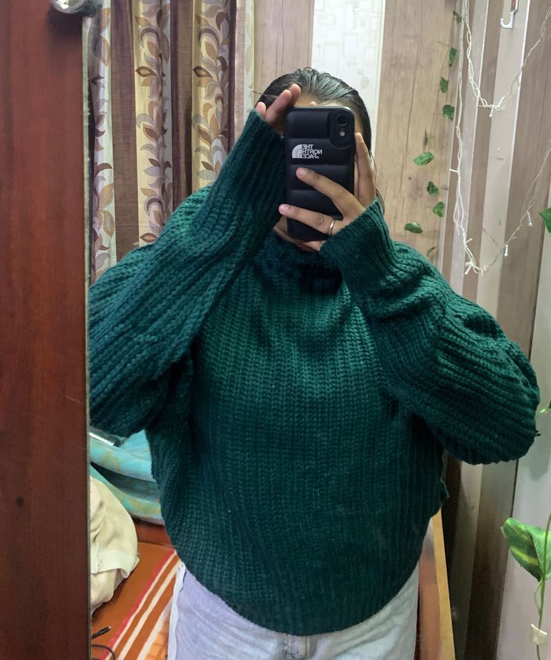 green sweater